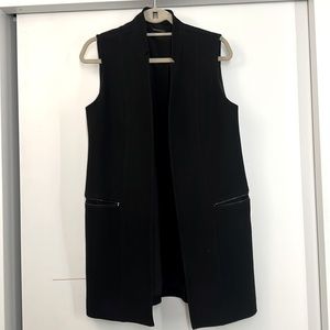 Mid length vest with pockets